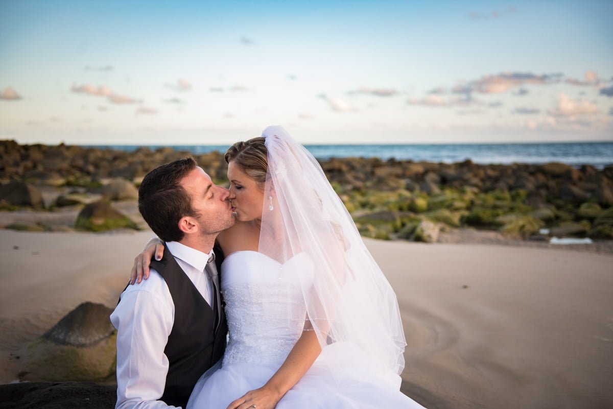 wedding kiss on the beach